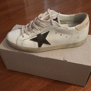 Golden Goose White Sneakers with Black Star Accent